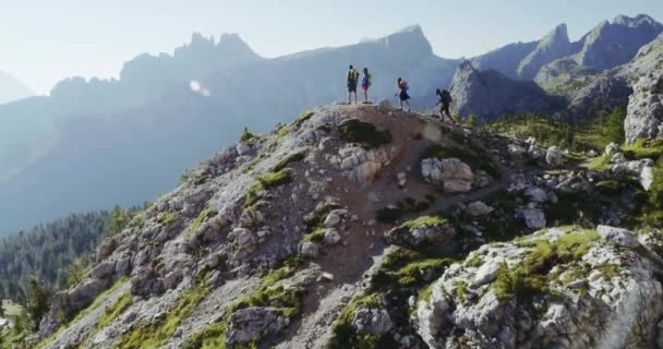 people hiking along trail path in sunny day - Footage, Video