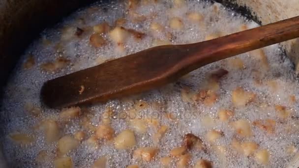 Making greaves from pork fat, Pork greaves preparation, Cooking greaves - Footage, Video