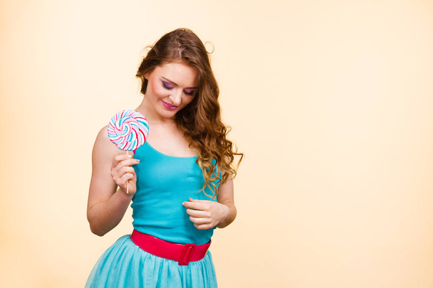 Woman joyful girl with lollipop candy - Fotoğraf, Görsel