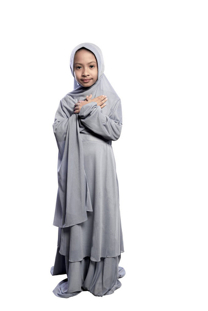 muslim child wearing hijab standing  - Zdjęcie, obraz