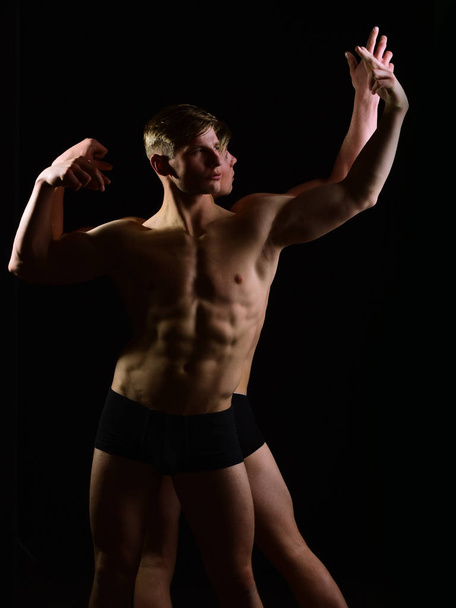 muscular twin men with bare torso, six pack in underwear - Fotografie, Obrázek