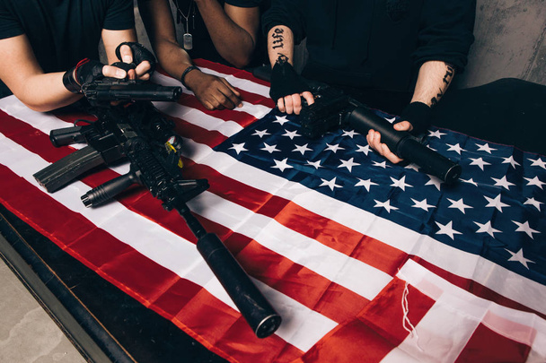 American arms dealers with weapon - Fotó, kép