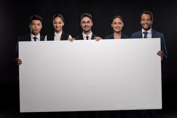 Business people with blank billboard  - Photo, Image