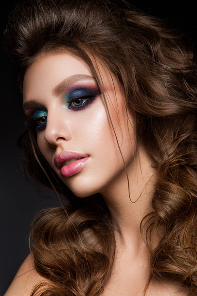 Beautiful young model with bright makeup and sunburn skin Evening make up - Photo, Image