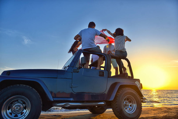 people having fun in convertible car - Φωτογραφία, εικόνα