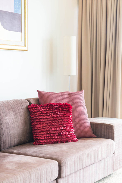 Beautiful pillow on sofa decoration in living room  - Фото, зображення