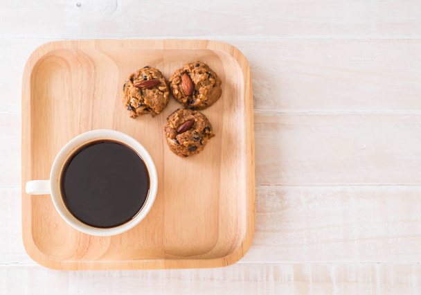 black coffee with cookies  - Фото, зображення