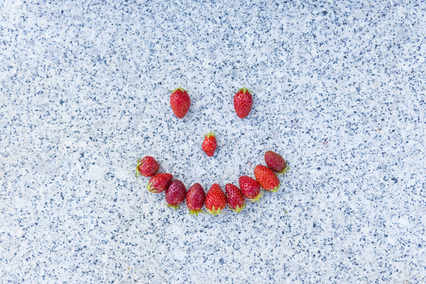 Smile made with strawberries - Photo, Image