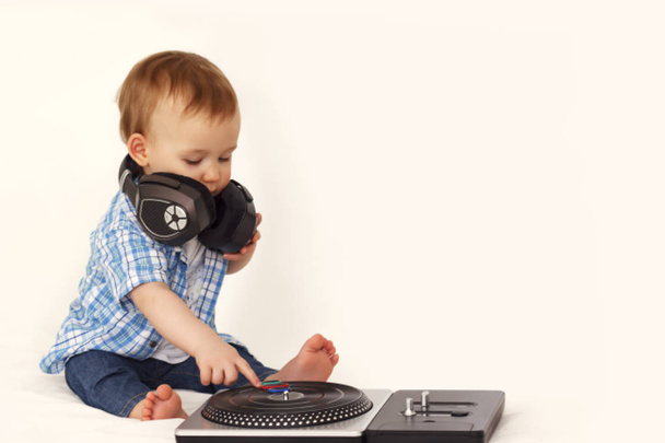 little boy in headphones with remote control - Photo, Image