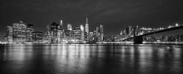 Black and white panoramic photo of Manhattan at night, NYC. - Photo, Image