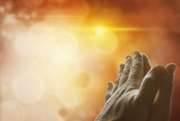 Handen samen bidden - Foto, afbeelding