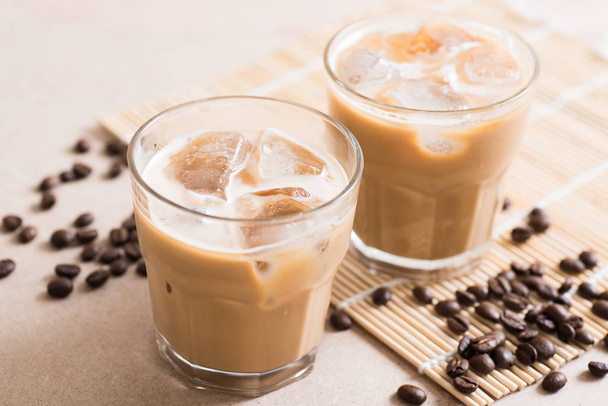 Glass of ice coffee with coffee bean  - 写真・画像