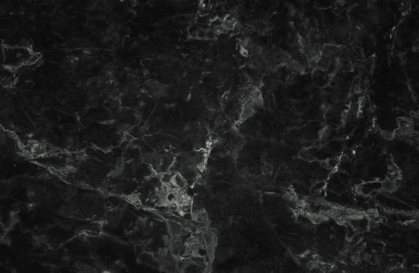 Zwarte marmeren textuur met delicate aderen, natuurlijke patroon voor achtergrond of achtergrond, kan ook worden gebruikt Creëer oppervlakte effect op architecturale slab, keramische vloer en wandtegels. - Foto, afbeelding