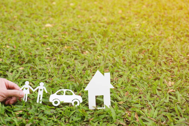Paper cut of family with house and car - Foto, imagen