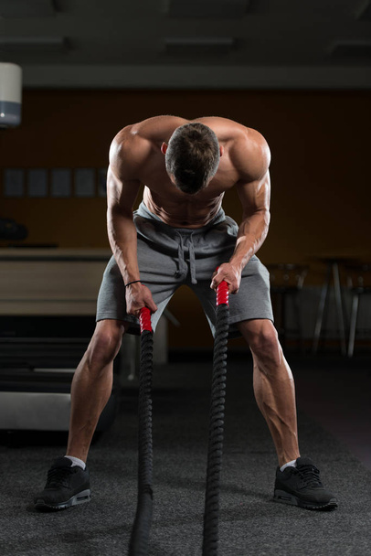 Young Man Battling Ropes At Gym Workout Exercise - Foto, Imagem
