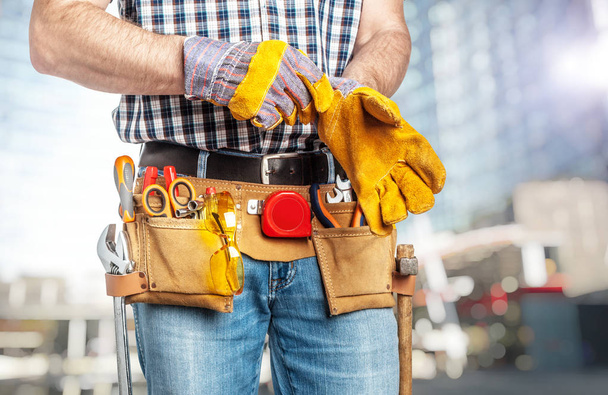 handyman wearing gloves - Foto, immagini
