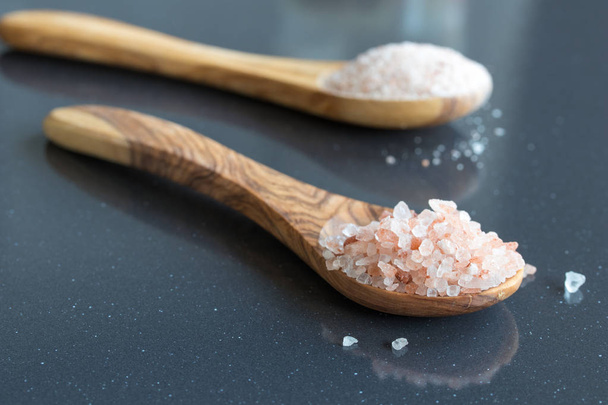 Pink Himalayan sea salt on two wooden spoons - Photo, Image