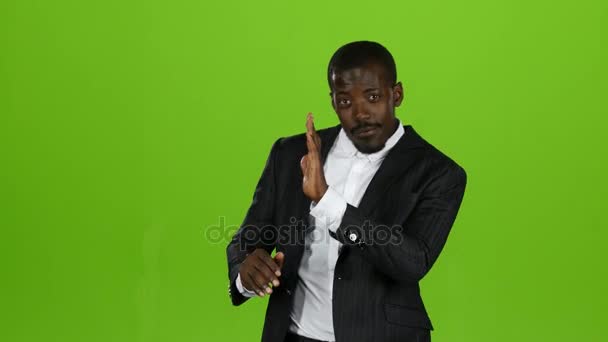 Businessman moves funny, tries to dance, claps cliques, has fun. Green screen - Filmmaterial, Video