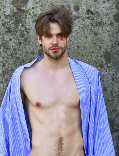 Caucasian macho in blue striped pajamas - Φωτογραφία, εικόνα