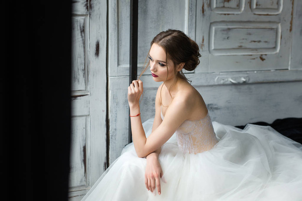 Portrait of a beautiful bride. Bride's fees in the studio - Valokuva, kuva