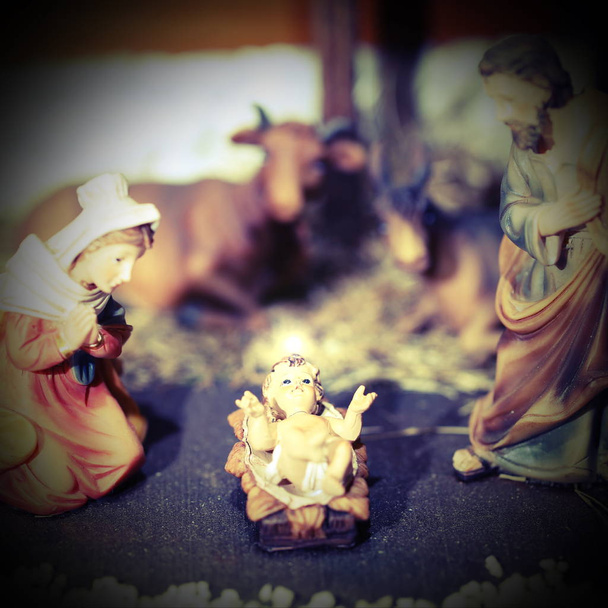 crib with jesus child who emits a white glow - Photo, Image