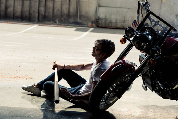 Stylish man with motorbike  - Foto, Imagen