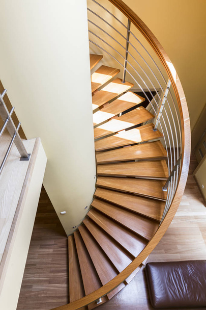 Wooden spiral staircase - Foto, imagen
