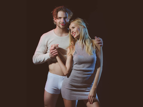 man, sexy guy in underwear pants and happy pretty girl - Fotografie, Obrázek