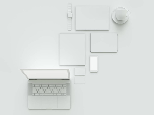 Modern office workplace with metallic laptop, digital tablet, mobile phone, papers, notepad and others business objects and items lying on a desk. Isolated on white background. - Photo, Image