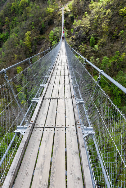 The suspension bridge over the valley at Semerntina, Switzerland - Photo, Image