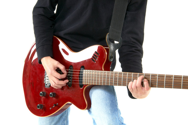 Guy playing guitar on white background - Zdjęcie, obraz