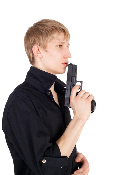 Boy with the pistol in his hand - Zdjęcie, obraz