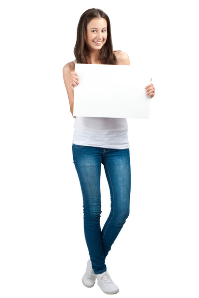 Casual girl holding a blank signboard - Foto, Bild