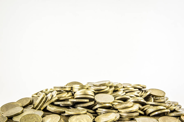A lot of coins on a white background - Photo, image