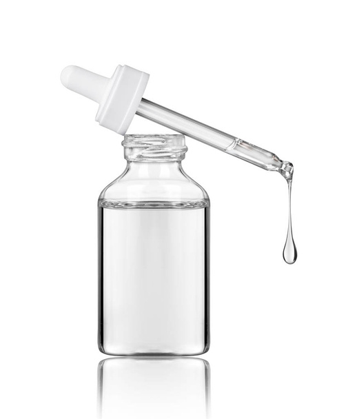 Cosmetic bottle with pipette on white background - Foto, Imagen
