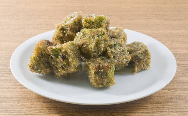 Plate of of Fried Steamed Dumpling Made of Garlic Chives - Photo, Image