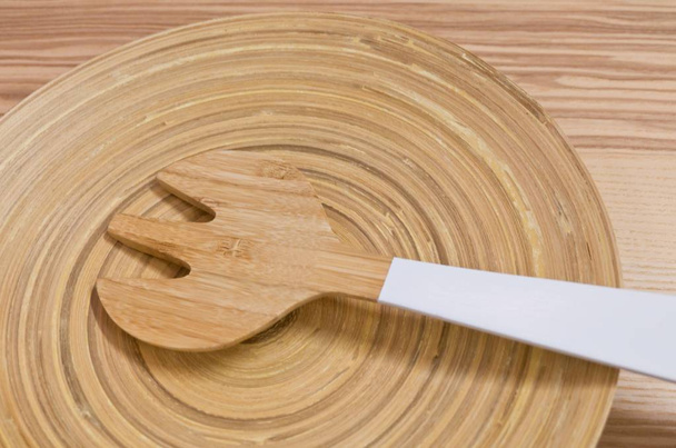 Wooden Fork Cutlery on A Wooden Dish - Photo, Image