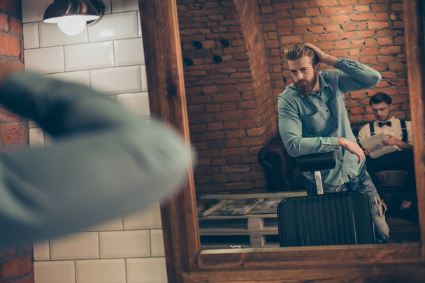 Barbershop concept. Reflection of red bearded harsh stylish man  - Фото, изображение