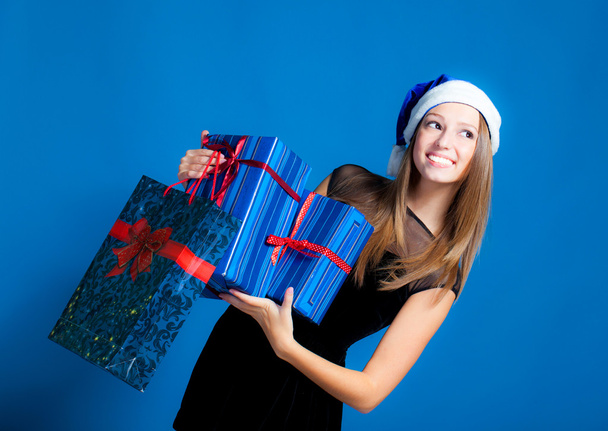 Girl with christmas presents - Foto, immagini