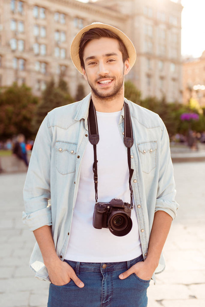 Young attractive guy is posing for photo of his summer holiday,  - Valokuva, kuva