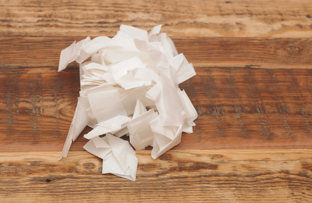 stack of crumpled papers on wooden table - Photo, Image