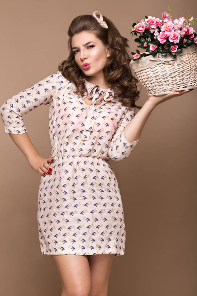 Fresh young girl, light silk dress, smile, retro curls pin-up style with basket of flowers. Beauty face , body. - Φωτογραφία, εικόνα