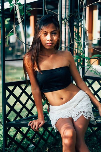Beautiful sexy Asian girl, in sexy summer outfit - 写真・画像