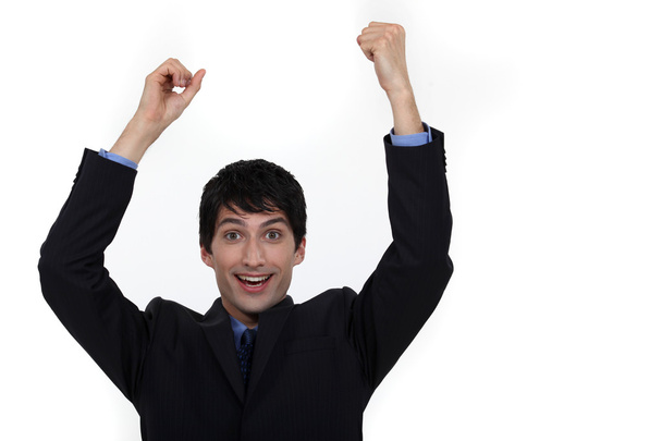 Happy businessman raising hands - Photo, Image