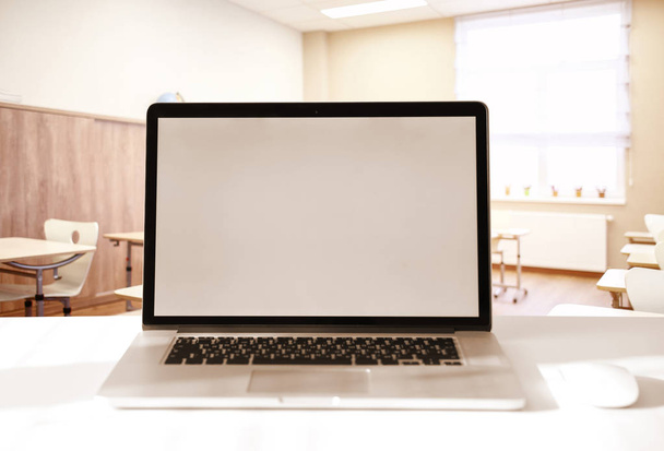 Modern laptop with blank screen - Foto, imagen