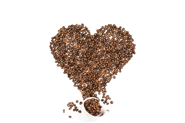 Heart symbol made from coffee seeds - Foto, immagini