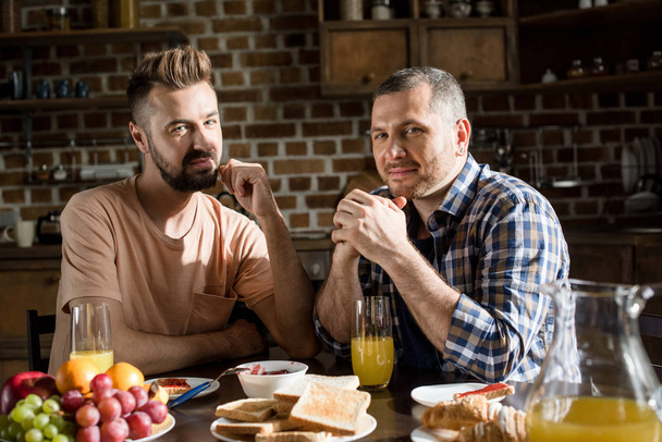 Gay couple having breakfast  - Fotoğraf, Görsel