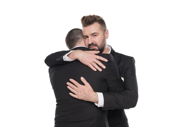 homosexual couple of grooms in suits - Foto, Bild