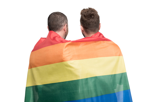 ομοφυλόφιλα ζευγάρια που καλύπτονται από τη σημαία των ΛΟΑΤ - Φωτογραφία, εικόνα