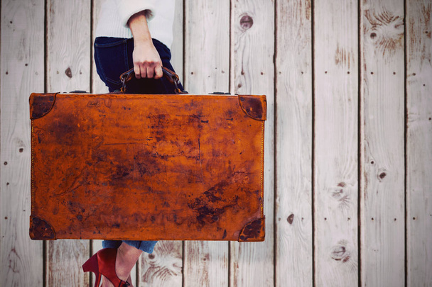 woman holding vintage suitcase  - Foto, Bild